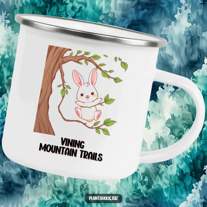 Funny camping mug with a playful rabbit dangling from a thick vine, mid-air, durable and humorous for outdoor adventurers.