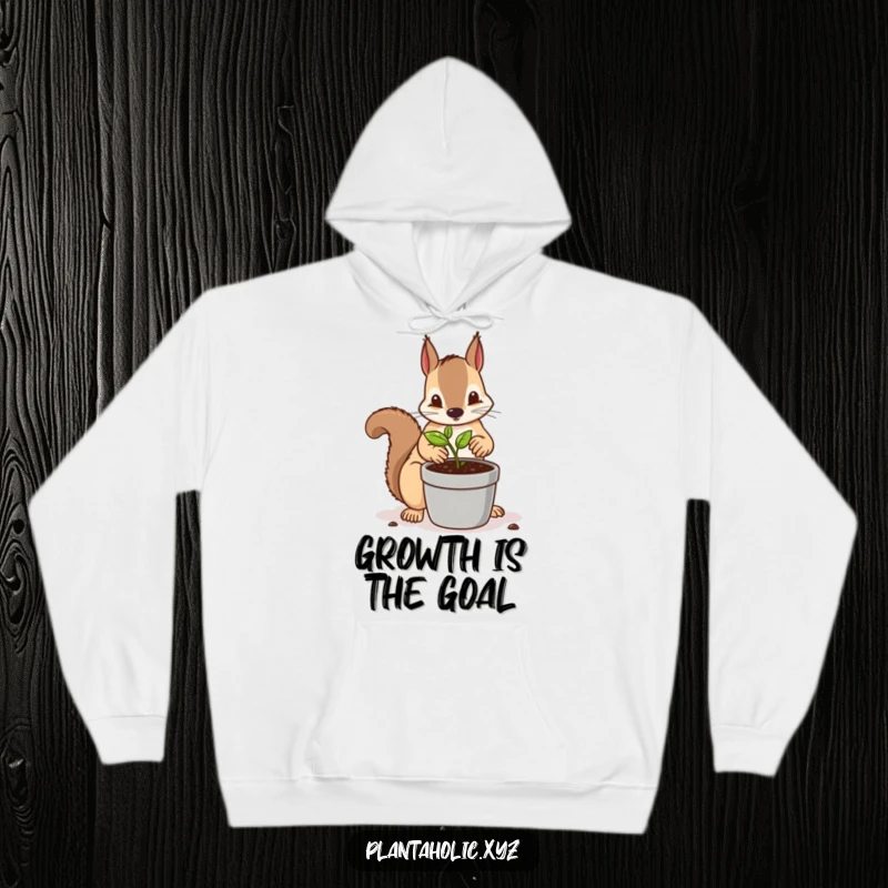 Funny hoodie with a determined squirrel meticulously repotting a tiny seedling into a larger container, cozy and diligent woodland apparel.